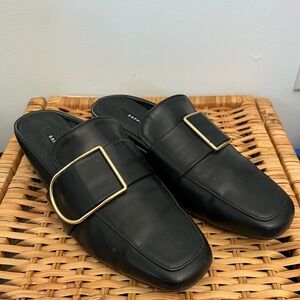 Elegant Black Leather Mules with Gold Accent